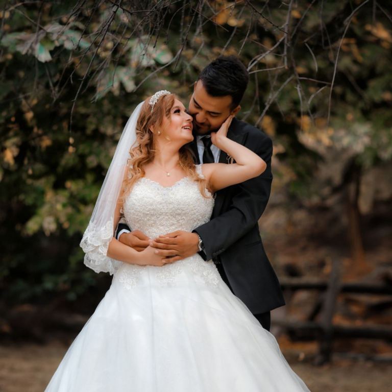 Wedding photoshoot with bride and groom in a romantic love embrace