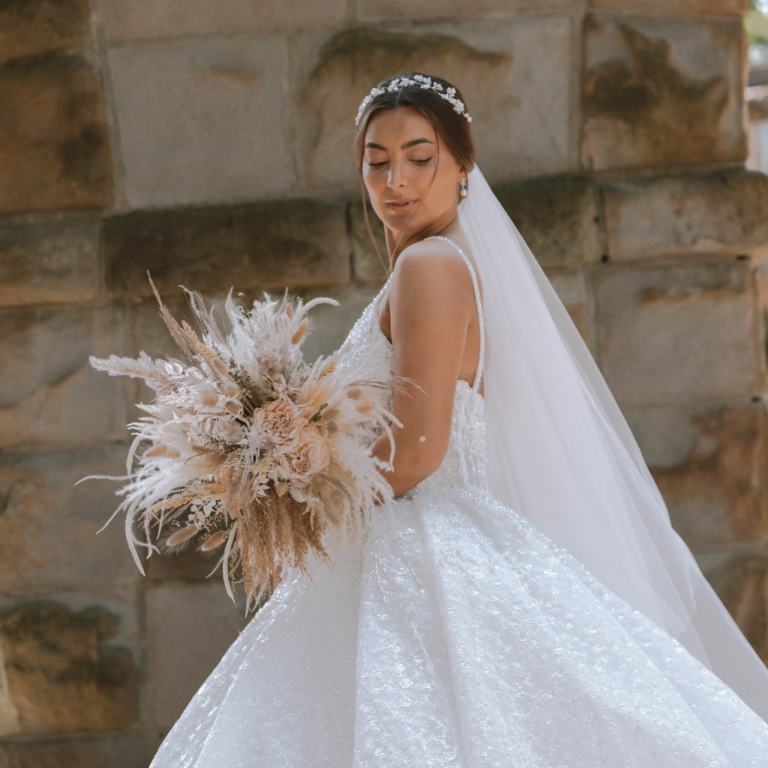 Wedding photoshoot of a beautiful bride posing for the camera