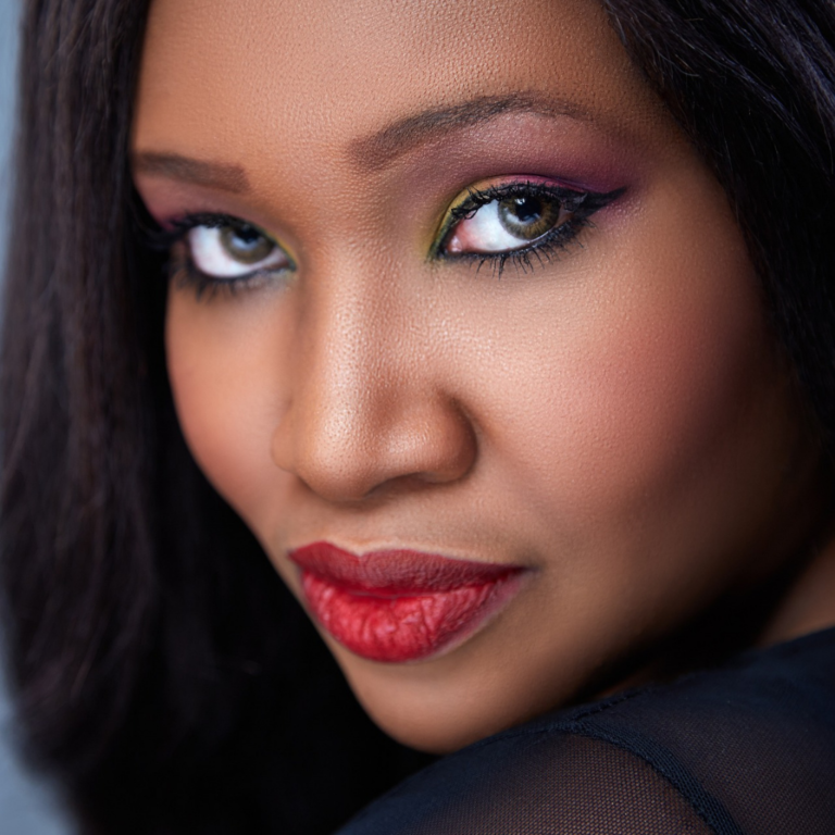 Personal Studio Portrait by Quintessence Photography UK. Headshot for a lady looking straight into the camera