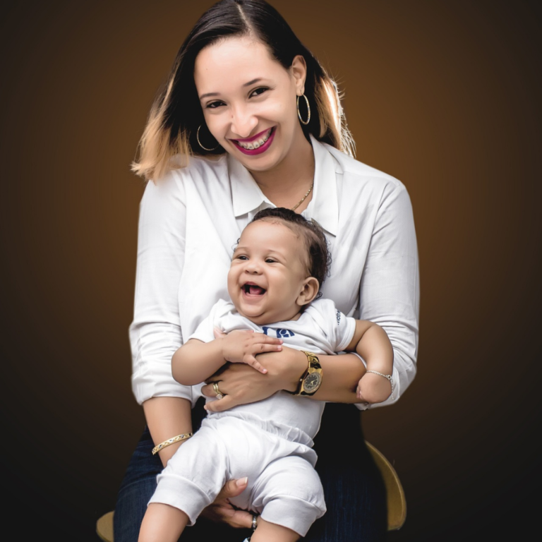 Family studio photoshoot by Quintessence Photography UK. A mother and child, smiling and happy