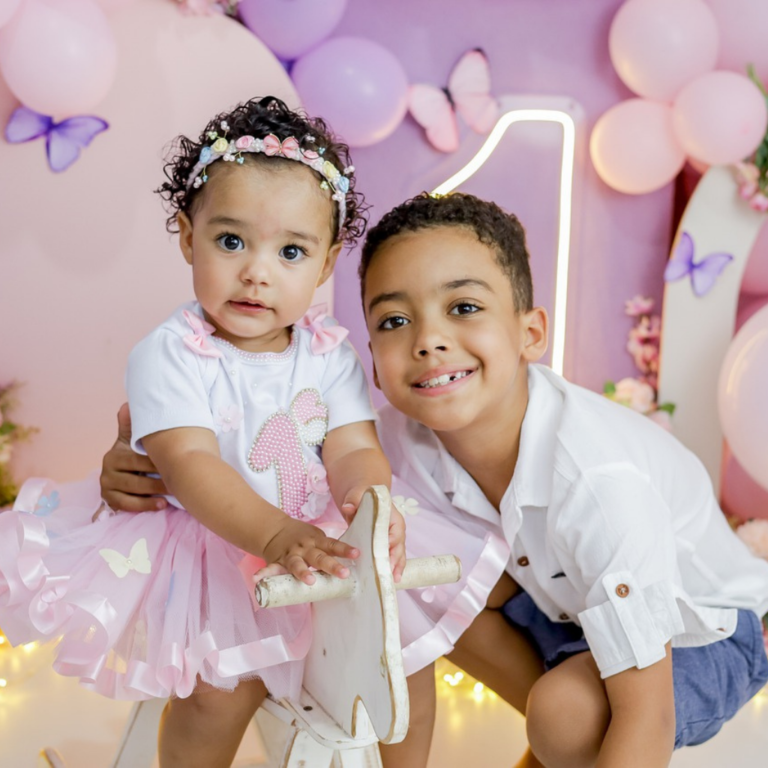 Birthday Photoshoot for a little girl, her brother, toys and balloons