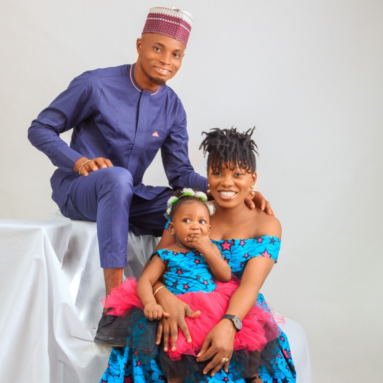 Family Portrait Studio Photoshoot for a Nigerian family with Father, Mother and Child